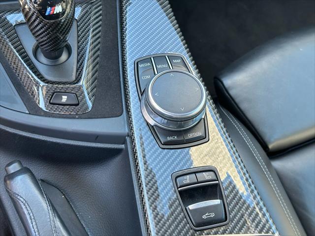 used 2018 BMW M4 car, priced at $43,800