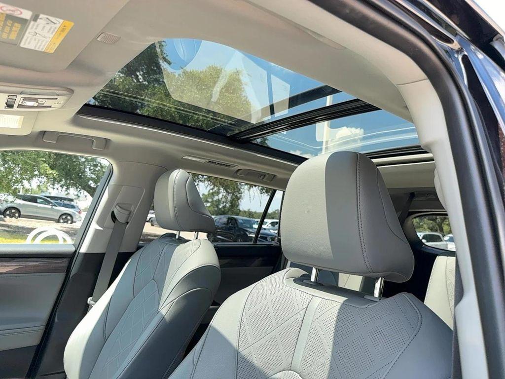 used 2021 Toyota Highlander Hybrid car, priced at $38,999