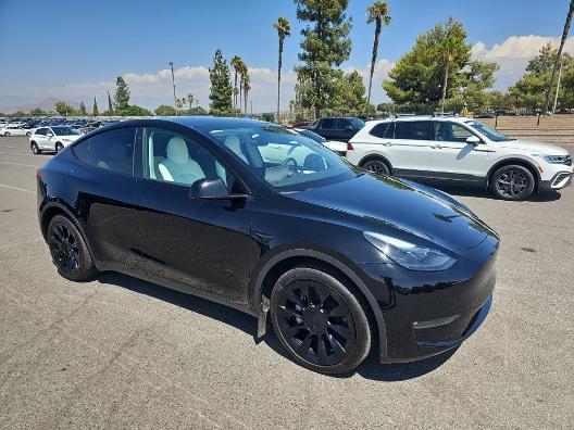 used 2023 Tesla Model Y car, priced at $36,936