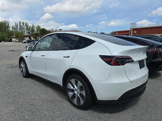 used 2023 Tesla Model Y car, priced at $33,933