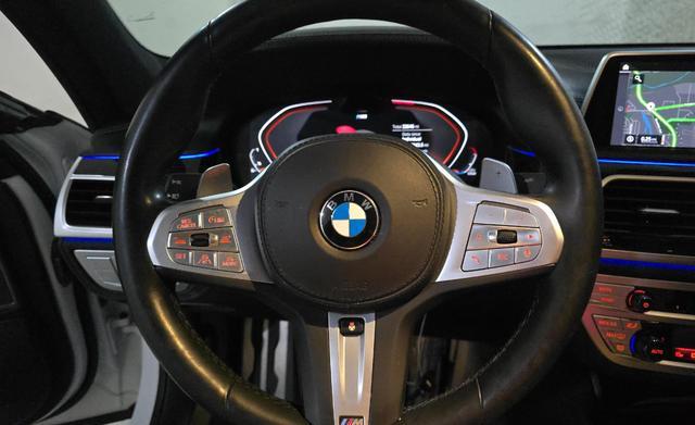 used 2022 BMW 750 car, priced at $51,777