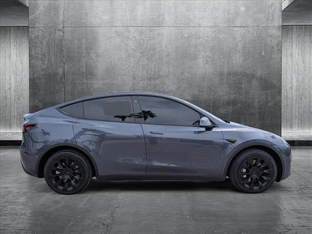 used 2023 Tesla Model Y car, priced at $28,991