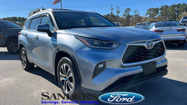 used 2021 Toyota Highlander Hybrid car, priced at $35,879