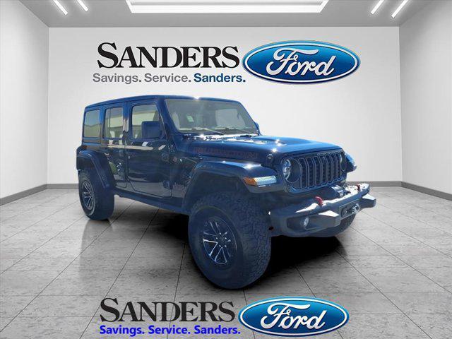 used 2024 Jeep Wrangler car, priced at $49,879