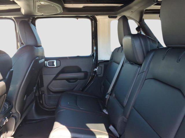 used 2024 Jeep Wrangler car, priced at $49,879