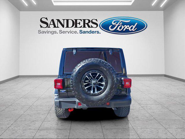 used 2024 Jeep Wrangler car, priced at $49,879