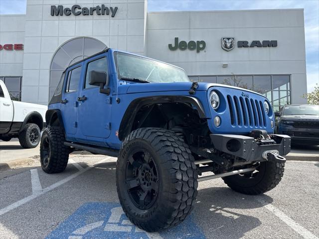used 2015 Jeep Wrangler Unlimited car, priced at $19,697