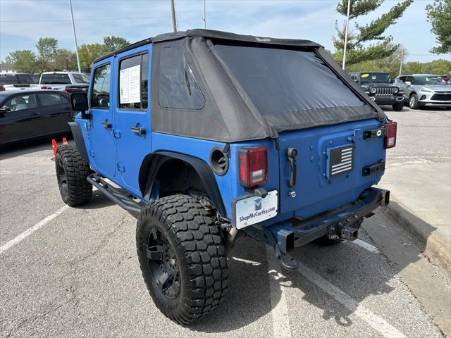 used 2015 Jeep Wrangler Unlimited car, priced at $21,812