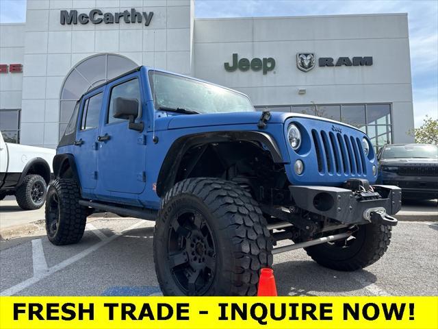 used 2015 Jeep Wrangler Unlimited car, priced at $21,896