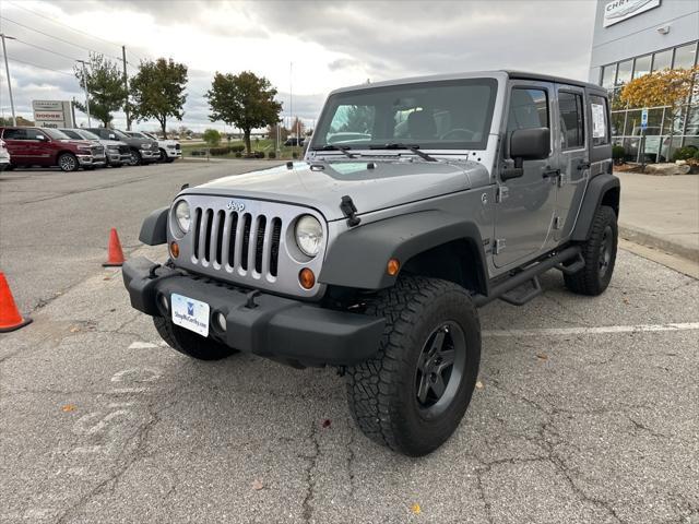 used 2013 Jeep Wrangler Unlimited car, priced at $14,000