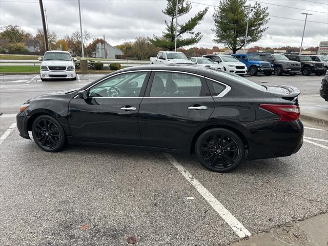 used 2018 Nissan Altima car, priced at $10,000