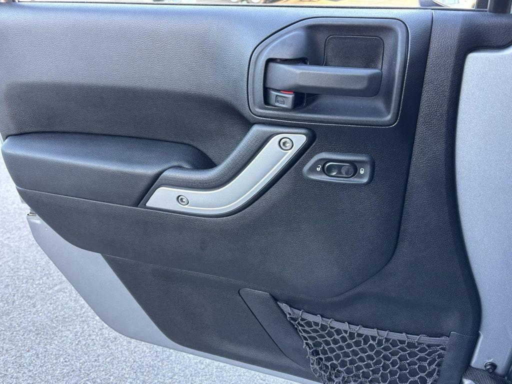 used 2014 Jeep Wrangler Unlimited car, priced at $16,989