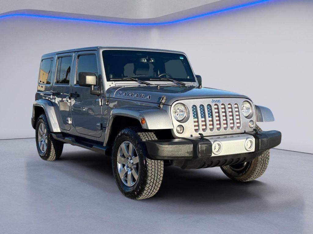 used 2014 Jeep Wrangler Unlimited car, priced at $16,989