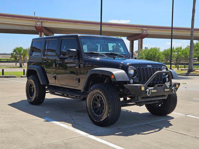 used 2015 Jeep Wrangler Unlimited car, priced at $19,056