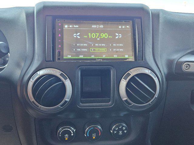 used 2015 Jeep Wrangler Unlimited car, priced at $19,056