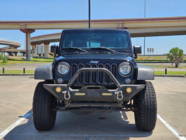 used 2015 Jeep Wrangler Unlimited car, priced at $19,056