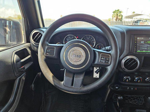 used 2015 Jeep Wrangler Unlimited car, priced at $19,056