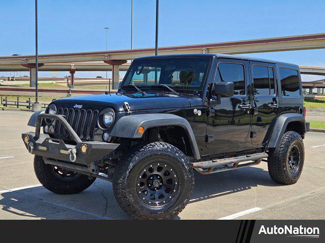 used 2015 Jeep Wrangler Unlimited car, priced at $19,056