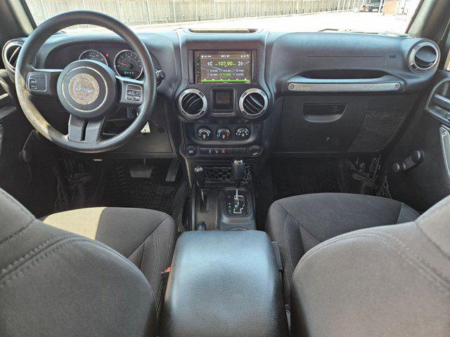 used 2015 Jeep Wrangler Unlimited car, priced at $19,056