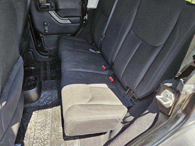 used 2015 Jeep Wrangler Unlimited car, priced at $19,056