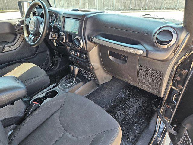 used 2015 Jeep Wrangler Unlimited car, priced at $19,056
