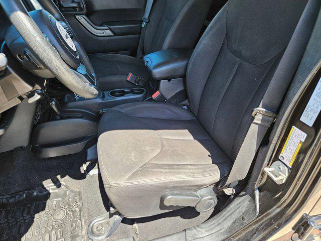 used 2015 Jeep Wrangler Unlimited car, priced at $19,056