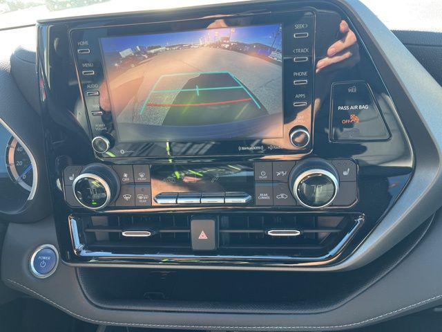used 2021 Toyota Highlander Hybrid car, priced at $29,689