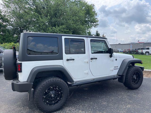 used 2015 Jeep Wrangler Unlimited car, priced at $19,371
