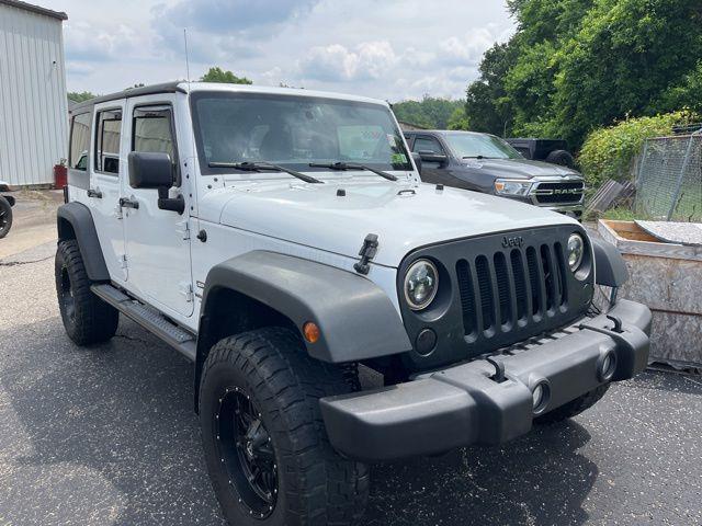 used 2015 Jeep Wrangler Unlimited car, priced at $19,371