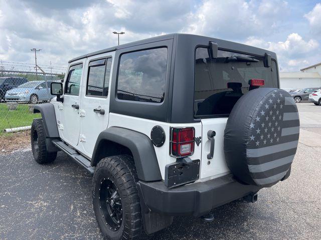 used 2015 Jeep Wrangler Unlimited car, priced at $19,371