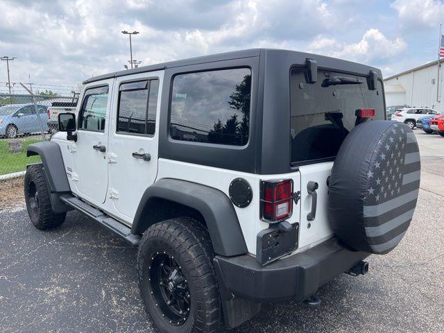 used 2015 Jeep Wrangler Unlimited car, priced at $19,371