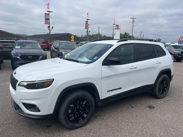 used 2023 Jeep Cherokee car, priced at $22,621