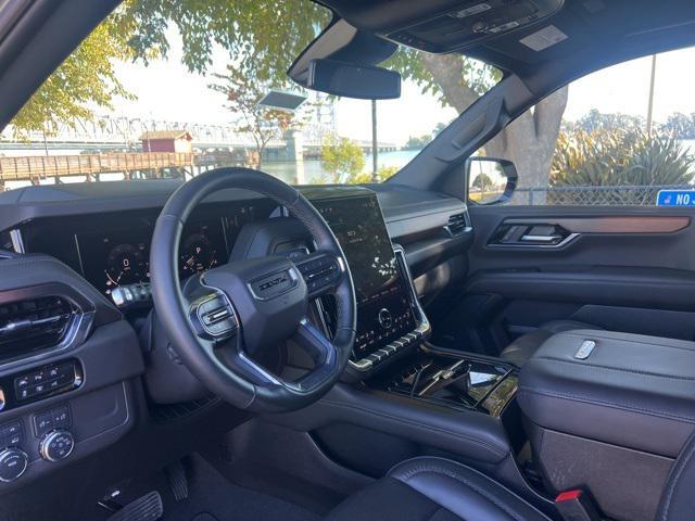 used 2025 GMC Yukon car, priced at $70,612