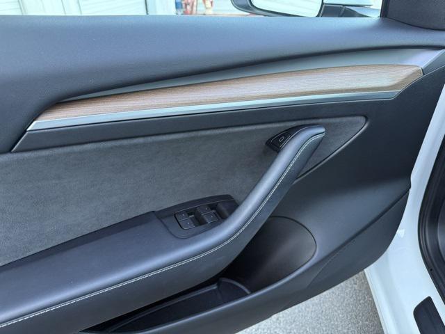 used 2023 Tesla Model 3 car, priced at $26,125