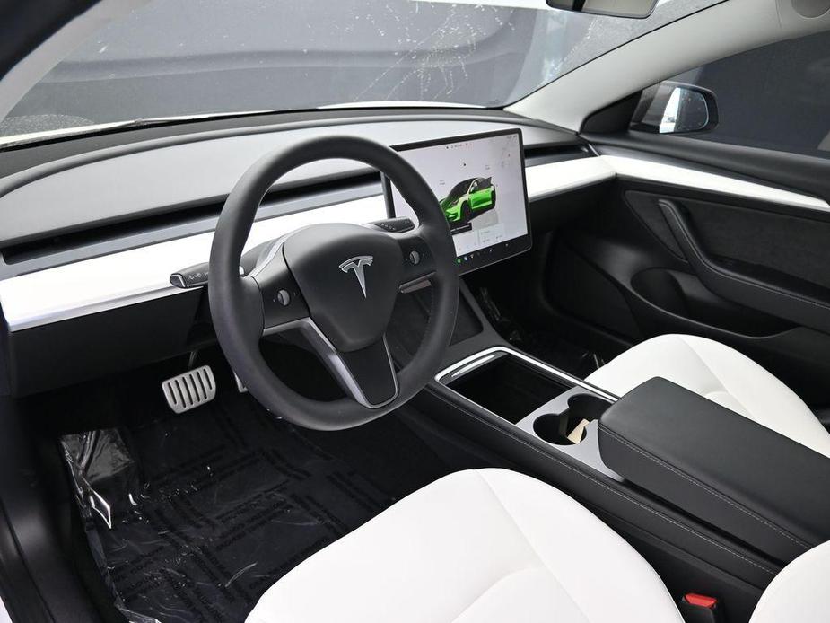 used 2022 Tesla Model 3 car, priced at $33,907