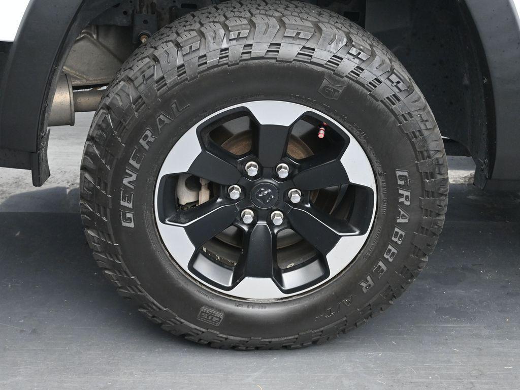 used 2019 Ram 1500 car, priced at $25,000