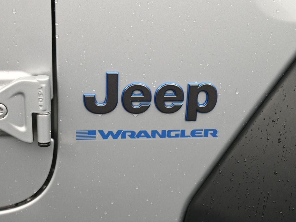 used 2023 Jeep Wrangler 4xe car, priced at $28,137