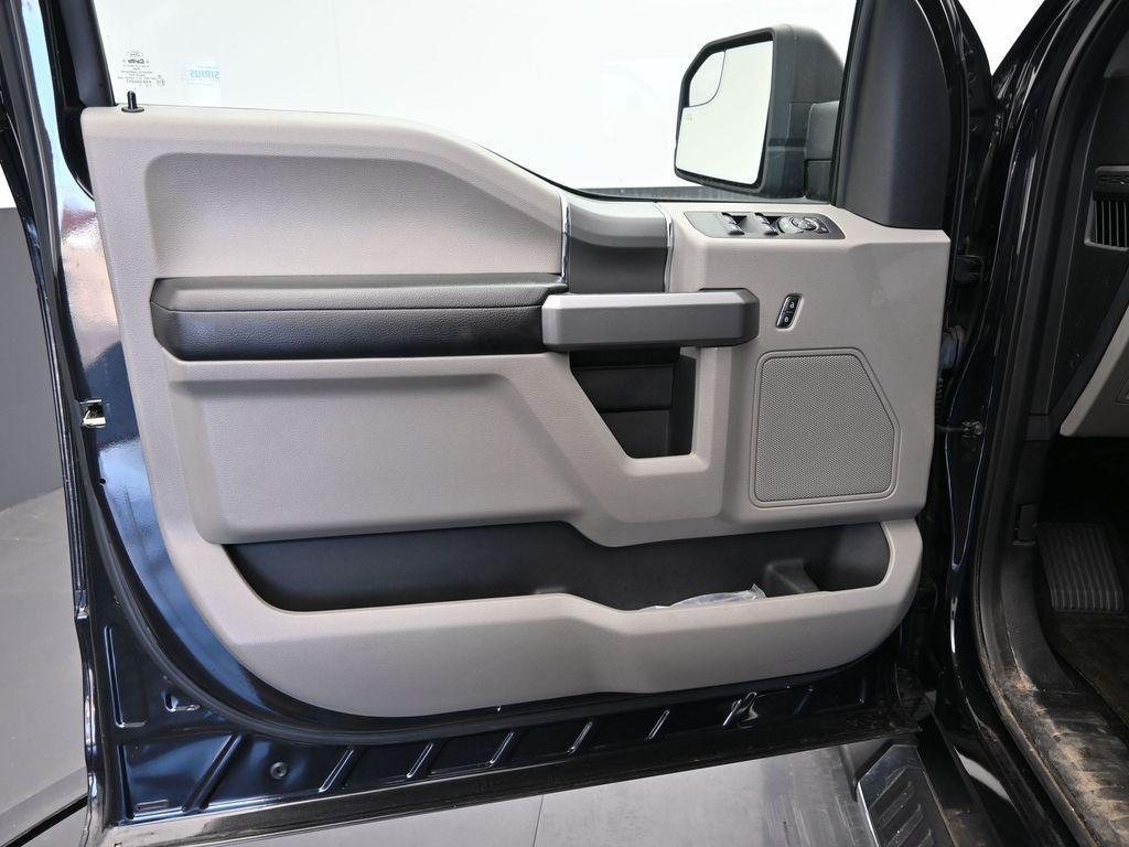 used 2015 Ford F-150 car, priced at $23,208