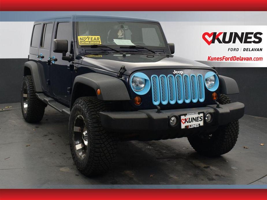 used 2013 Jeep Wrangler Unlimited car, priced at $16,122