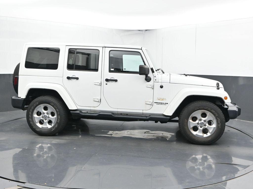 used 2013 Jeep Wrangler Unlimited car, priced at $15,400