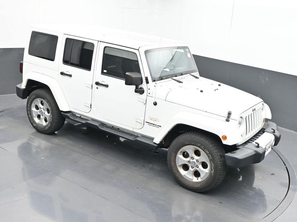 used 2013 Jeep Wrangler Unlimited car, priced at $15,400