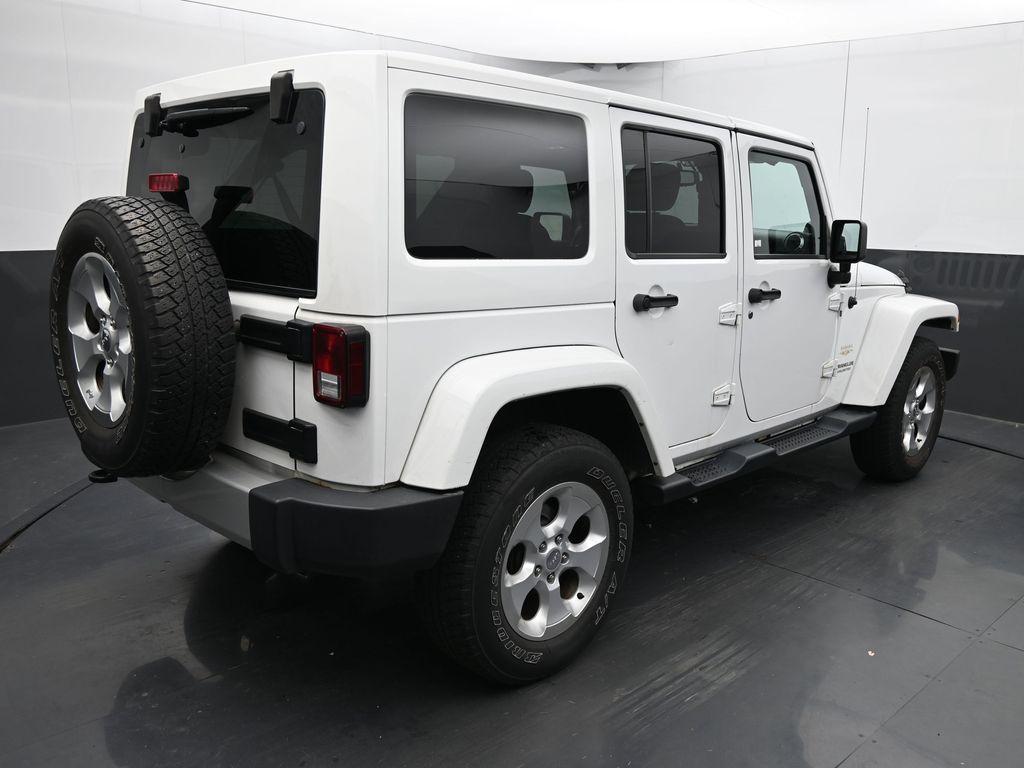 used 2013 Jeep Wrangler Unlimited car, priced at $15,400