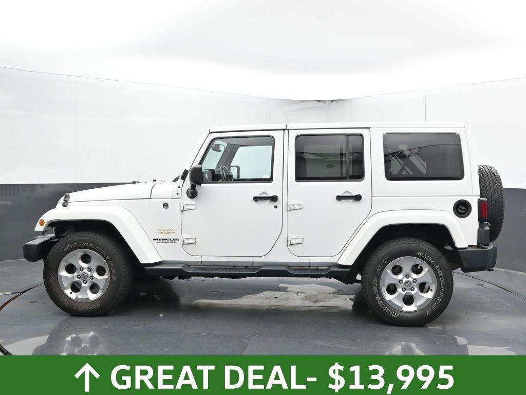 used 2013 Jeep Wrangler Unlimited car, priced at $13,995