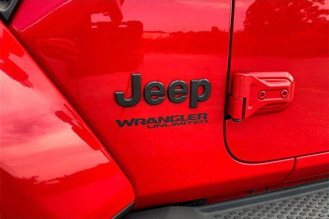 used 2021 Jeep Wrangler Unlimited car, priced at $31,178