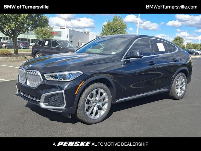 used 2022 BMW X6 car, priced at $57,227