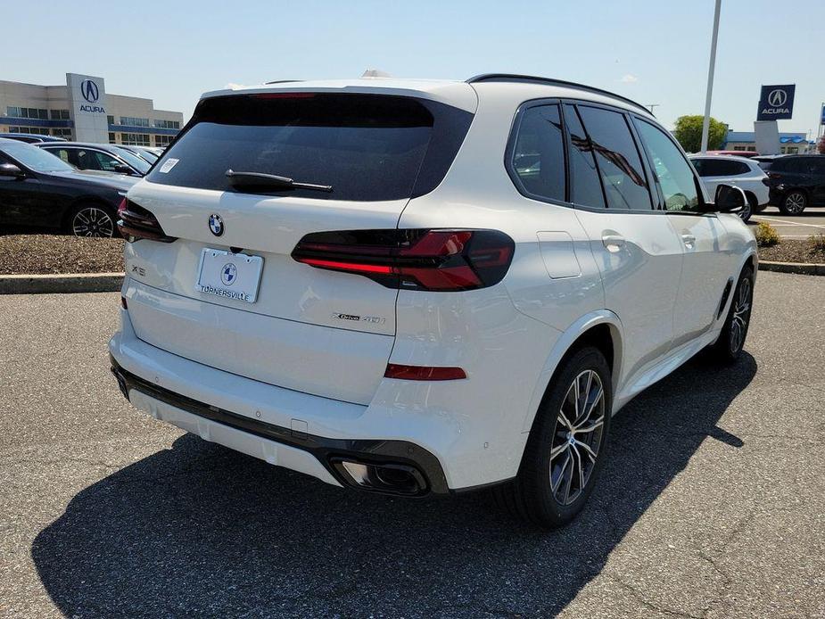 used 2025 BMW X5 car, priced at $77,005