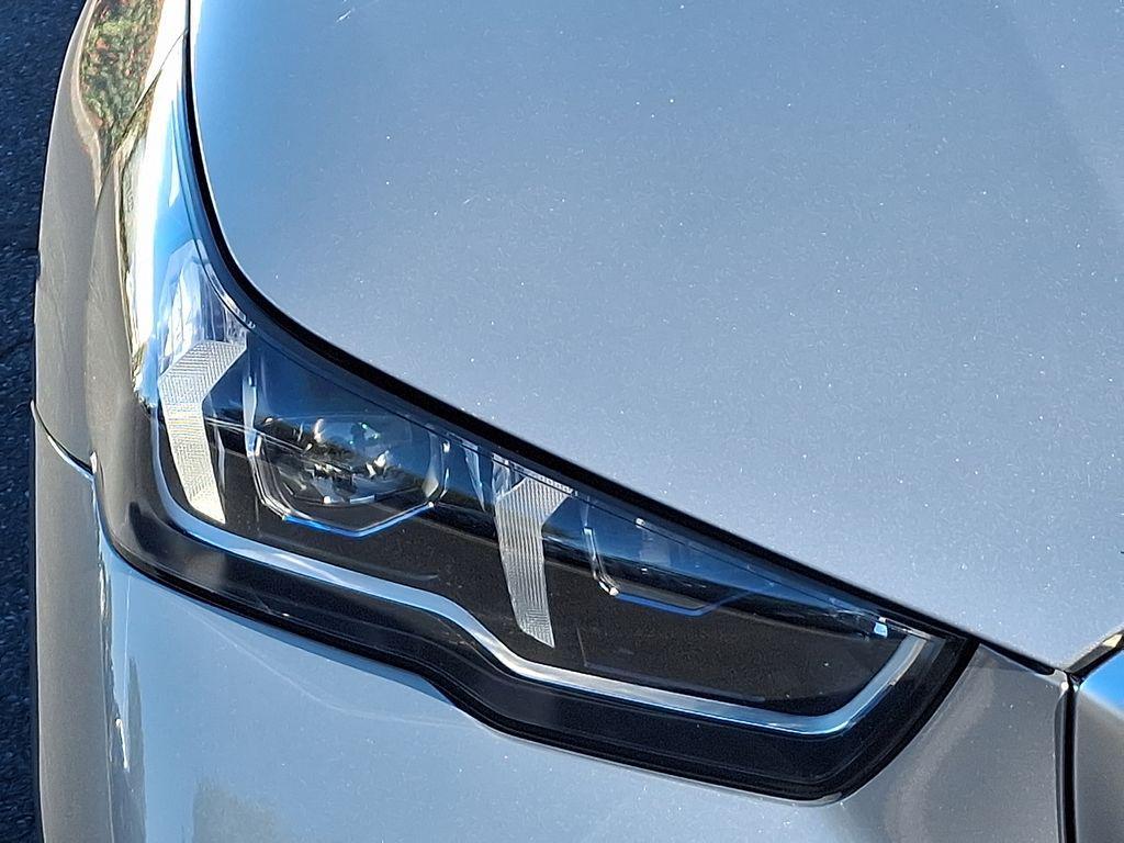 used 2025 BMW i5 car, priced at $66,828