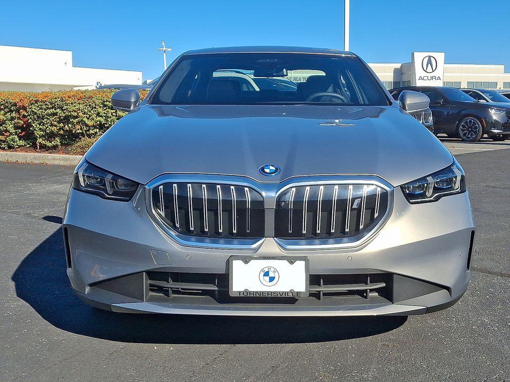 used 2025 BMW i5 car, priced at $66,828