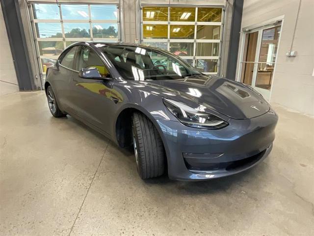 used 2023 Tesla Model 3 car, priced at $25,400