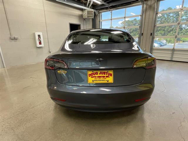 used 2023 Tesla Model 3 car, priced at $25,400